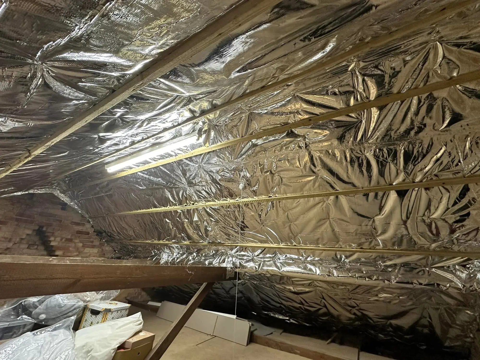 Superfoil insulated loft to retain headroom